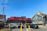 Local on 'the elevatiion'  above KK Avenue with 9 cars for Jones Island at the harbor